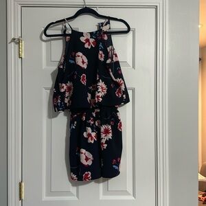 Flower design romper for kids/teens that is brand new condition XS